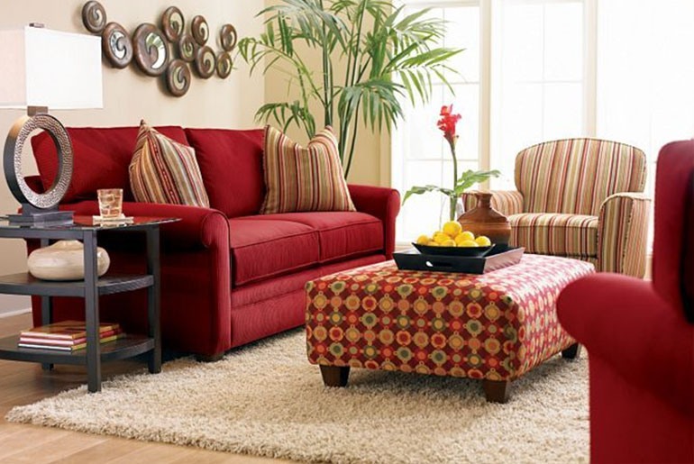 beige rug with red couch