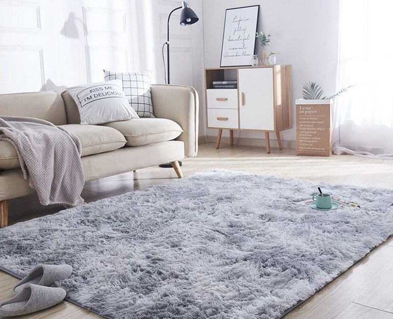 gray rug with beige couch