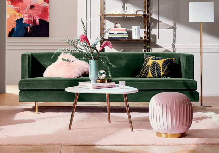 pink rug with green couch