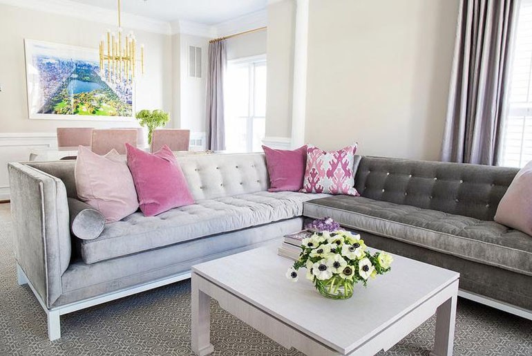 grey couch pink pillows