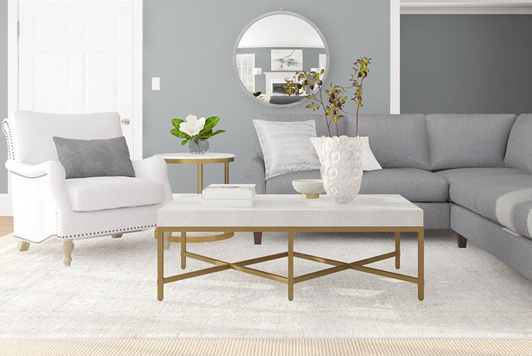 light gray sofa with white chair